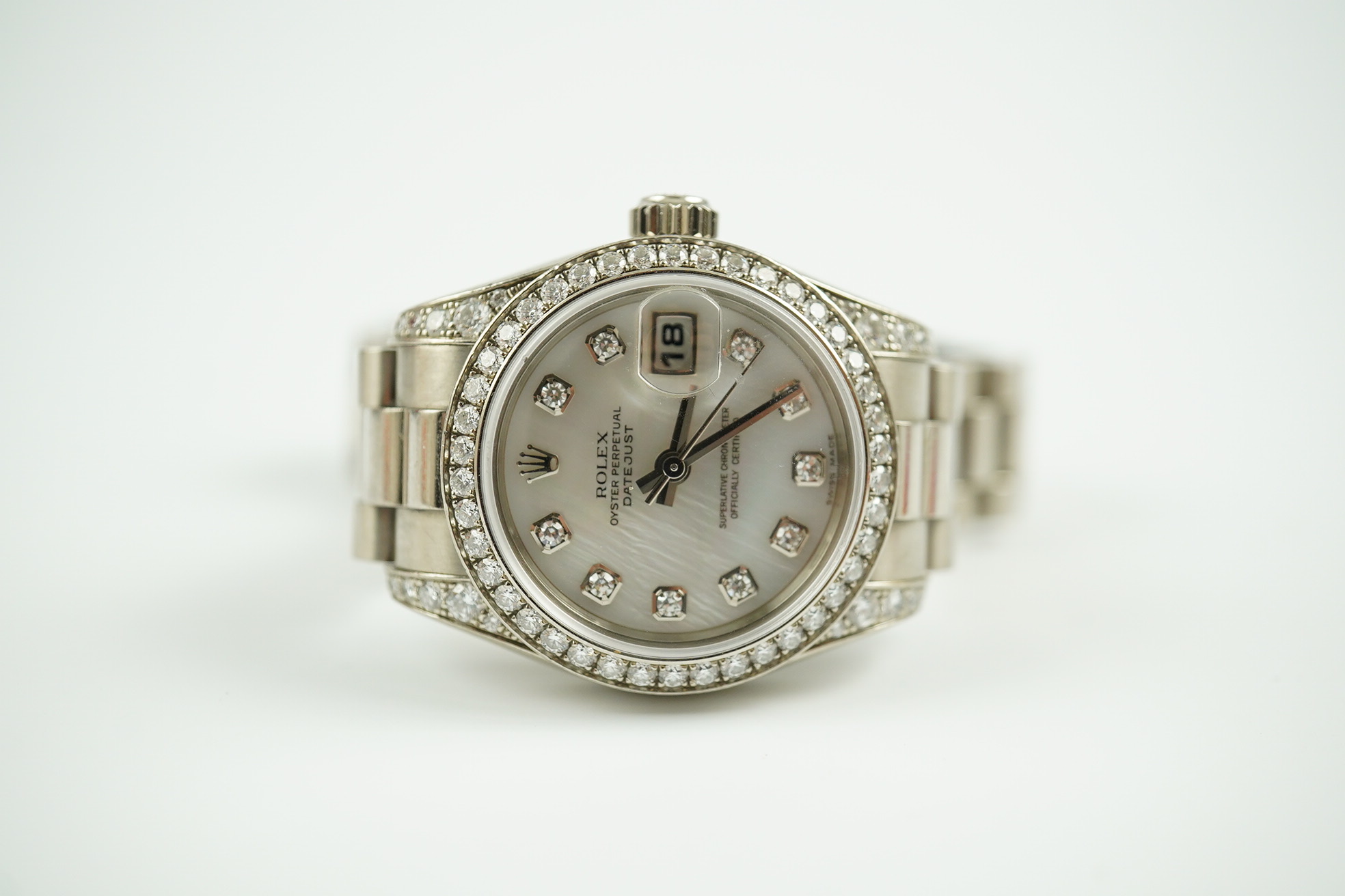 A lady's 2006 18ct white gold and diamond Rolex Oyster Perpetual Datejust wrist watch, on an 18ct white gold Rolex bracelet with deployment clasp